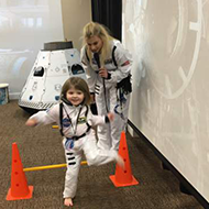 Child Walking in a Space Suit